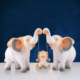 Elephant Family Showpiece with Baby on Swing - White