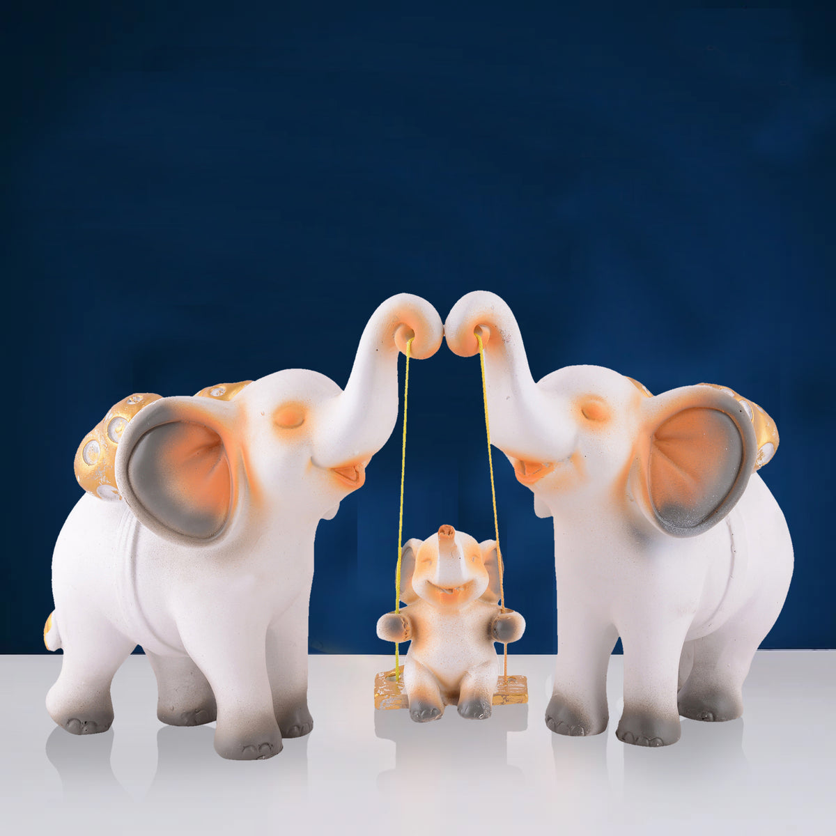 Elephant Family Showpiece with Baby on Swing - White