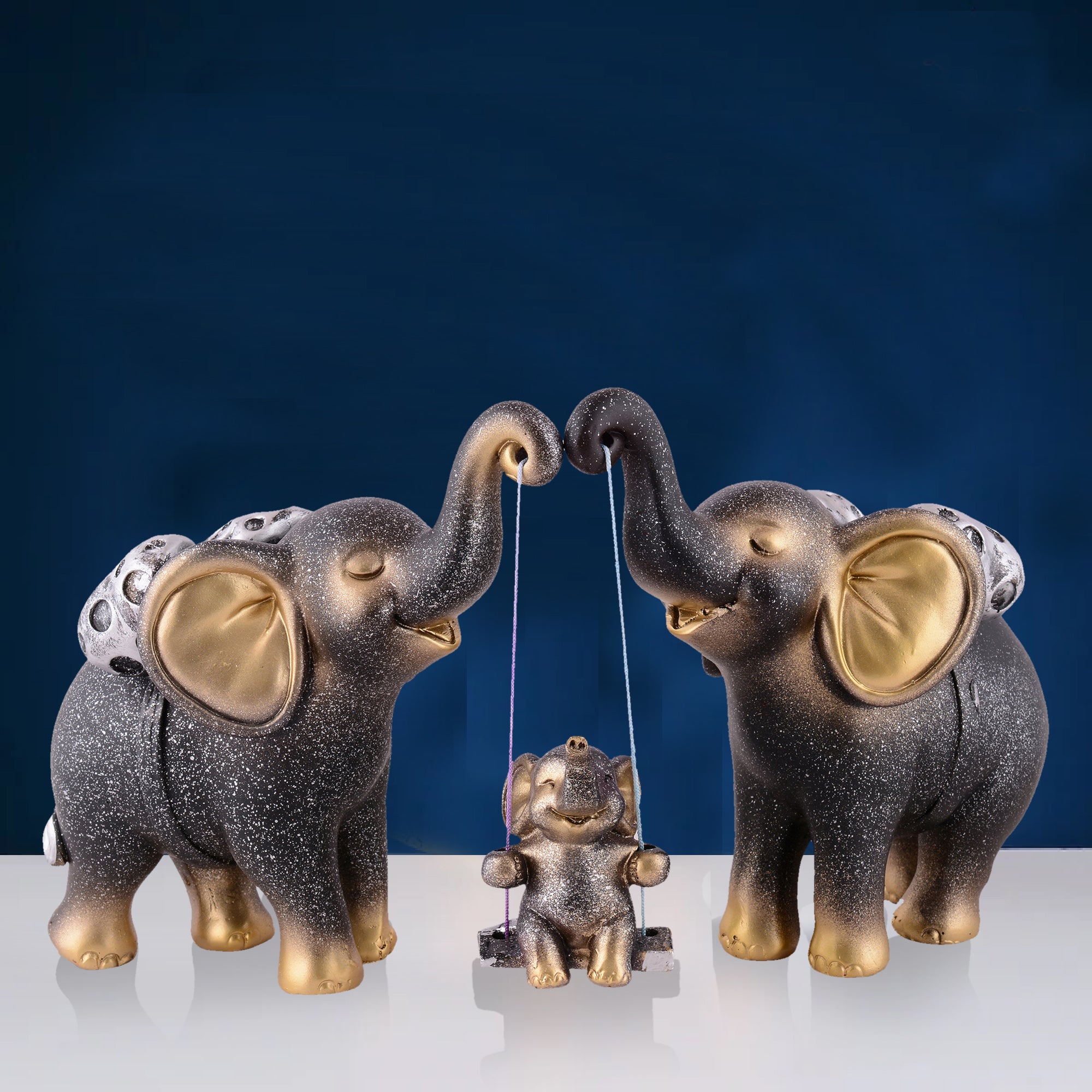Elephant Family Showpiece with Baby on Swing - White