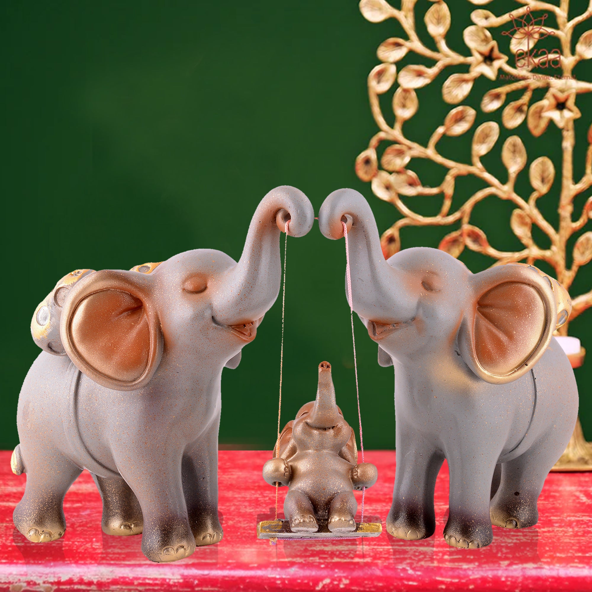 Elephant Family Showpiece with Baby on Swing - White