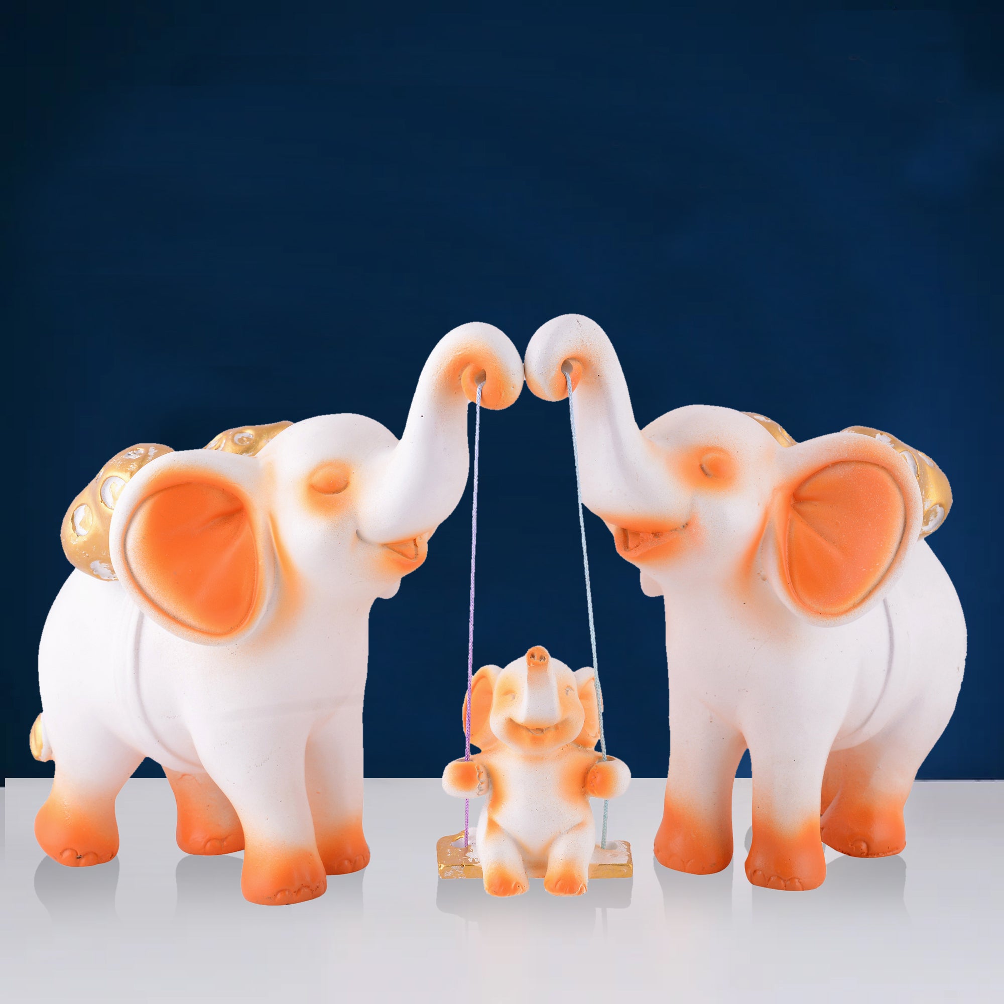 Elephant Family Showpiece with Baby on Swing - White