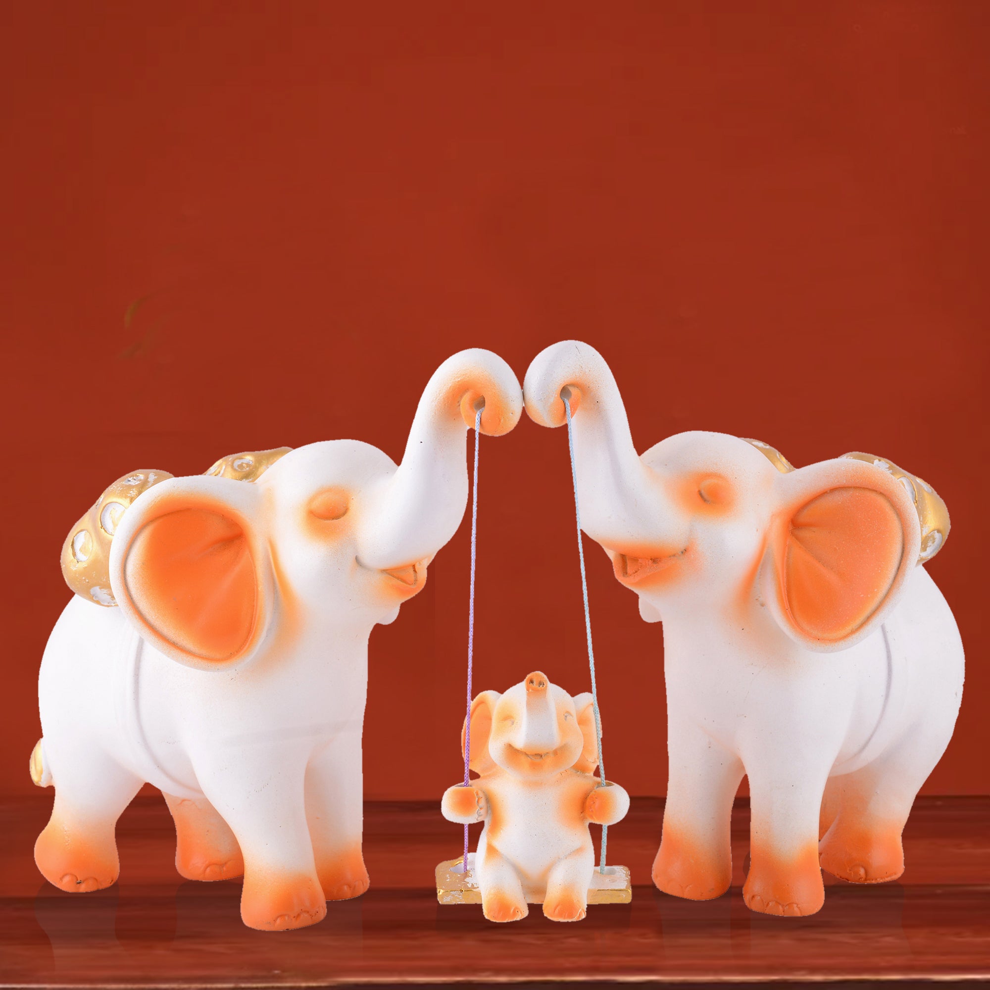 Elephant Family Showpiece with Baby on Swing - White