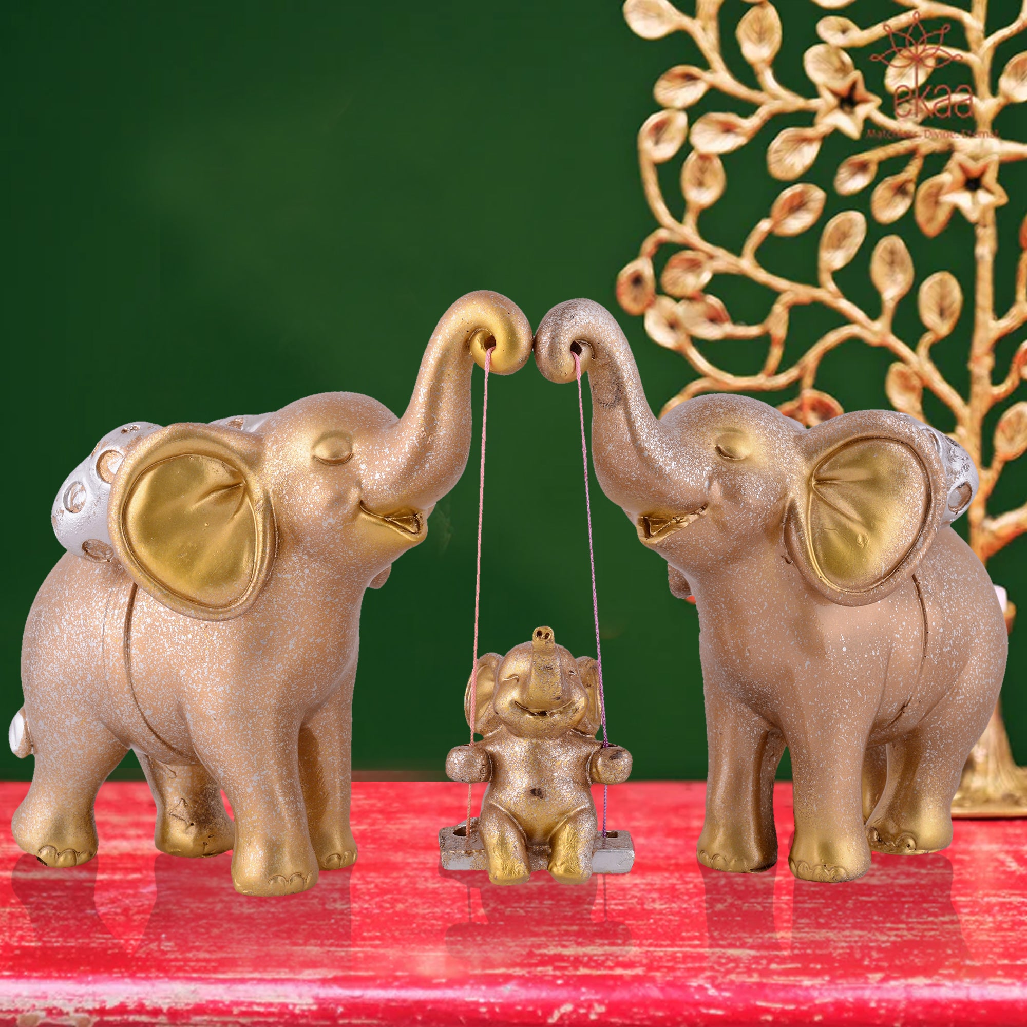 Elephant Family Showpiece with Baby on Swing - White