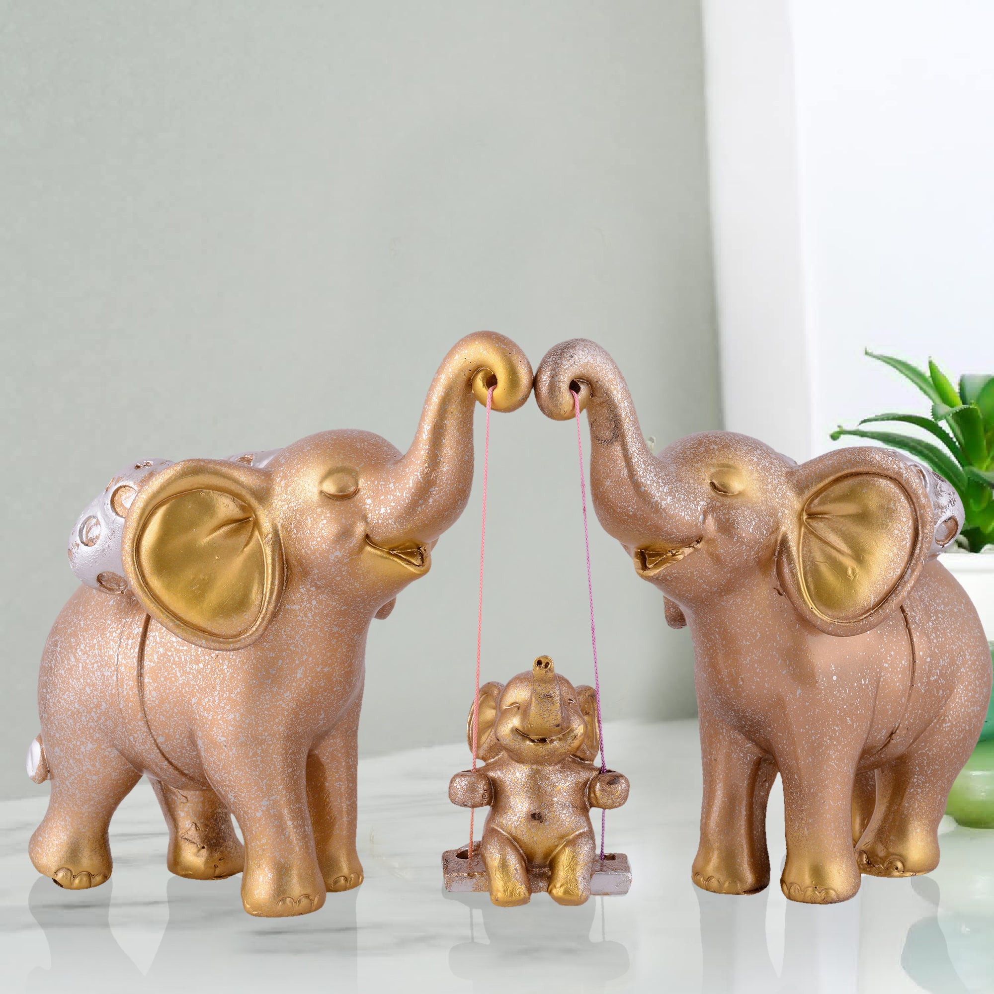 Elephant Family Showpiece with Baby on Swing - White